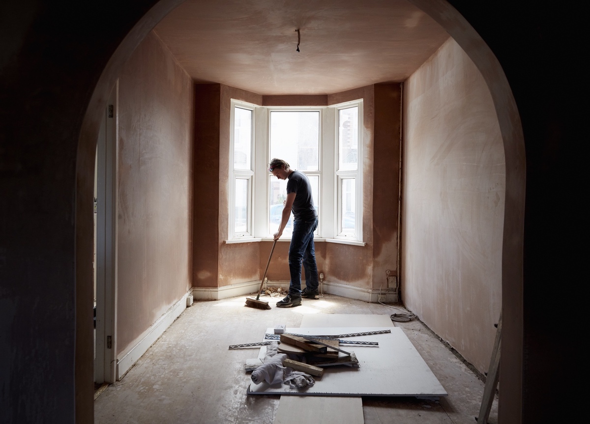 Contractor managing a renovation project in a new space.